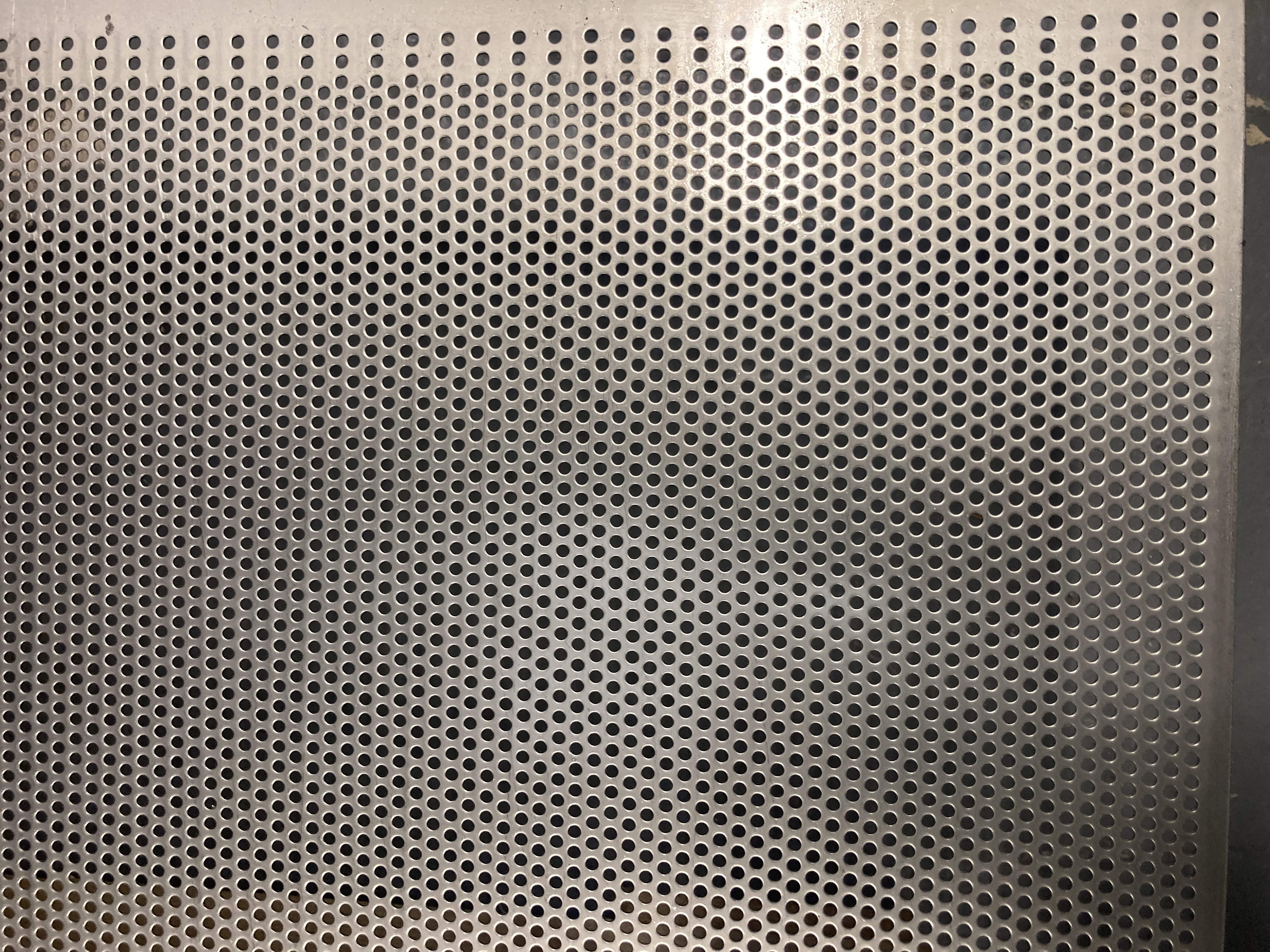 Perforated titanium